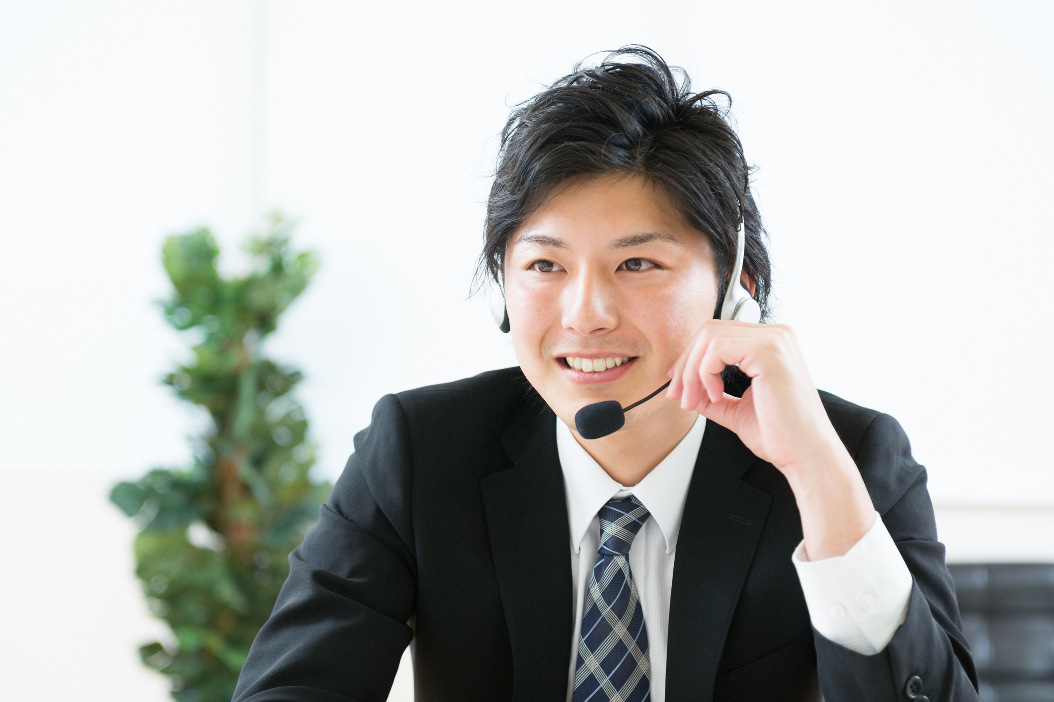 Japanese businessman wearing headset